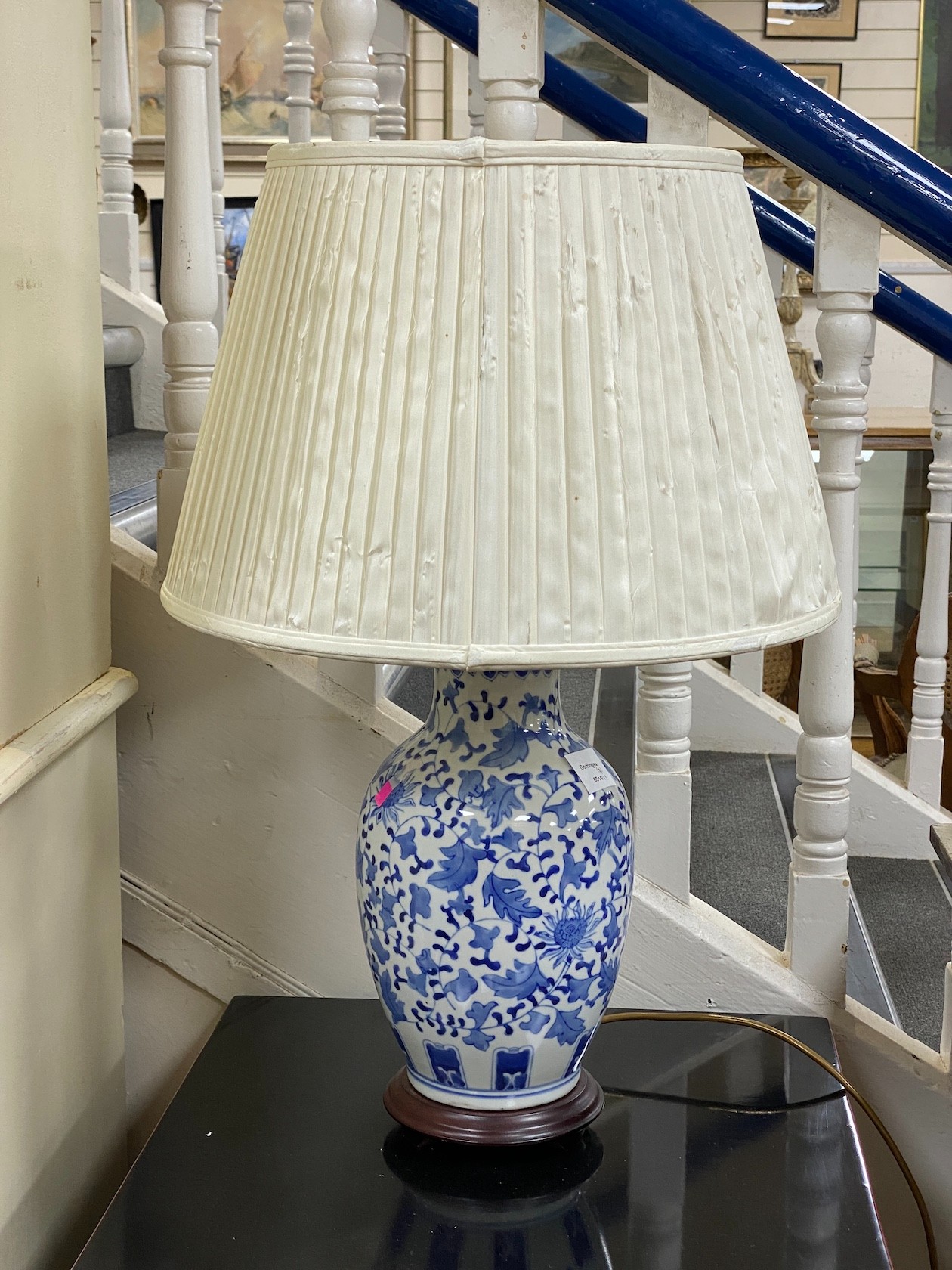A pair modern Chinese lacquer box chests together with a pair of blue and white table lamps, lamps height 70cm